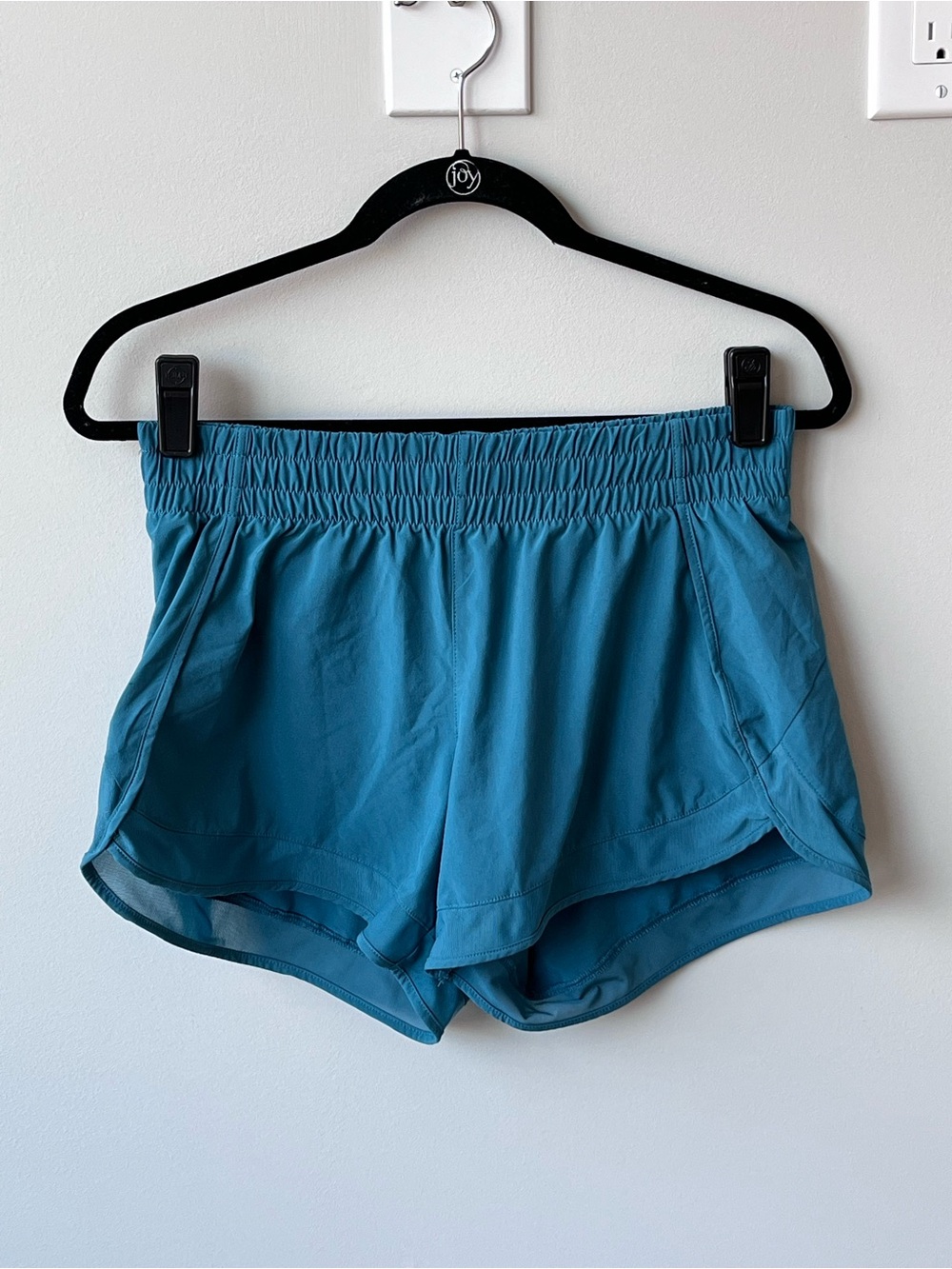 Athleta Mesh Racer Mid-Rise Lined Run Shorts 4” Women Small Teal Blue Zip Pocket